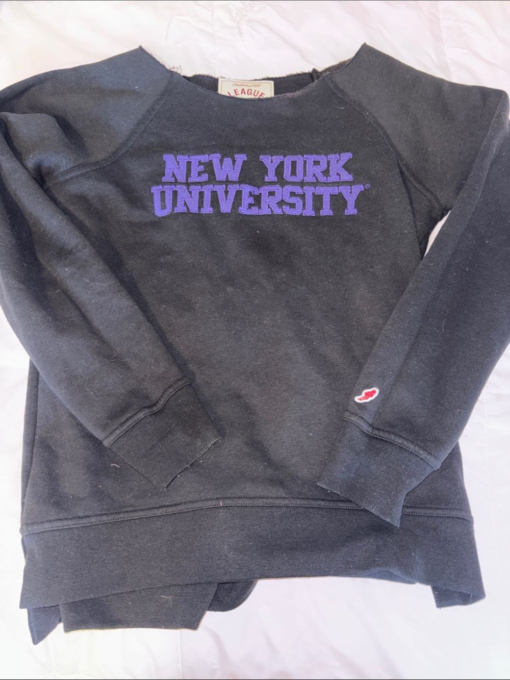 League Black Crewneck Sweatshirt with Purple NYU Lettering